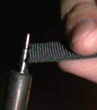 Melting edges of webbing to keep from unraveling