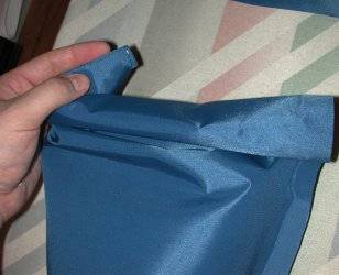 Rolling up bag to check length