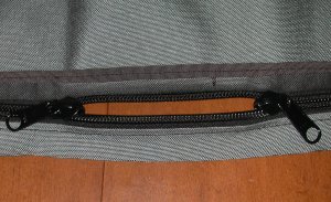 Details of the dual zipper pulls, prior to joining the short side to the front panel.