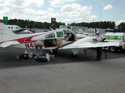 Unloading the plane at the Newport News Airport